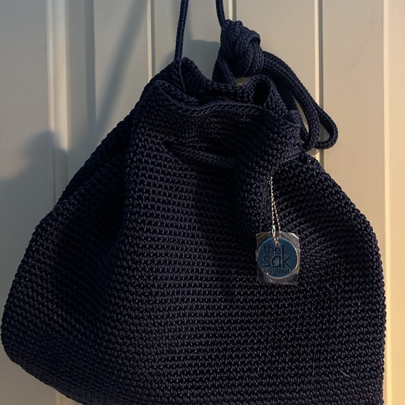 NWOT The Sak Navy Hand-Crochet Bag. Nice zip up pocket on outside.Navy Blue. - Picture 2 of 6